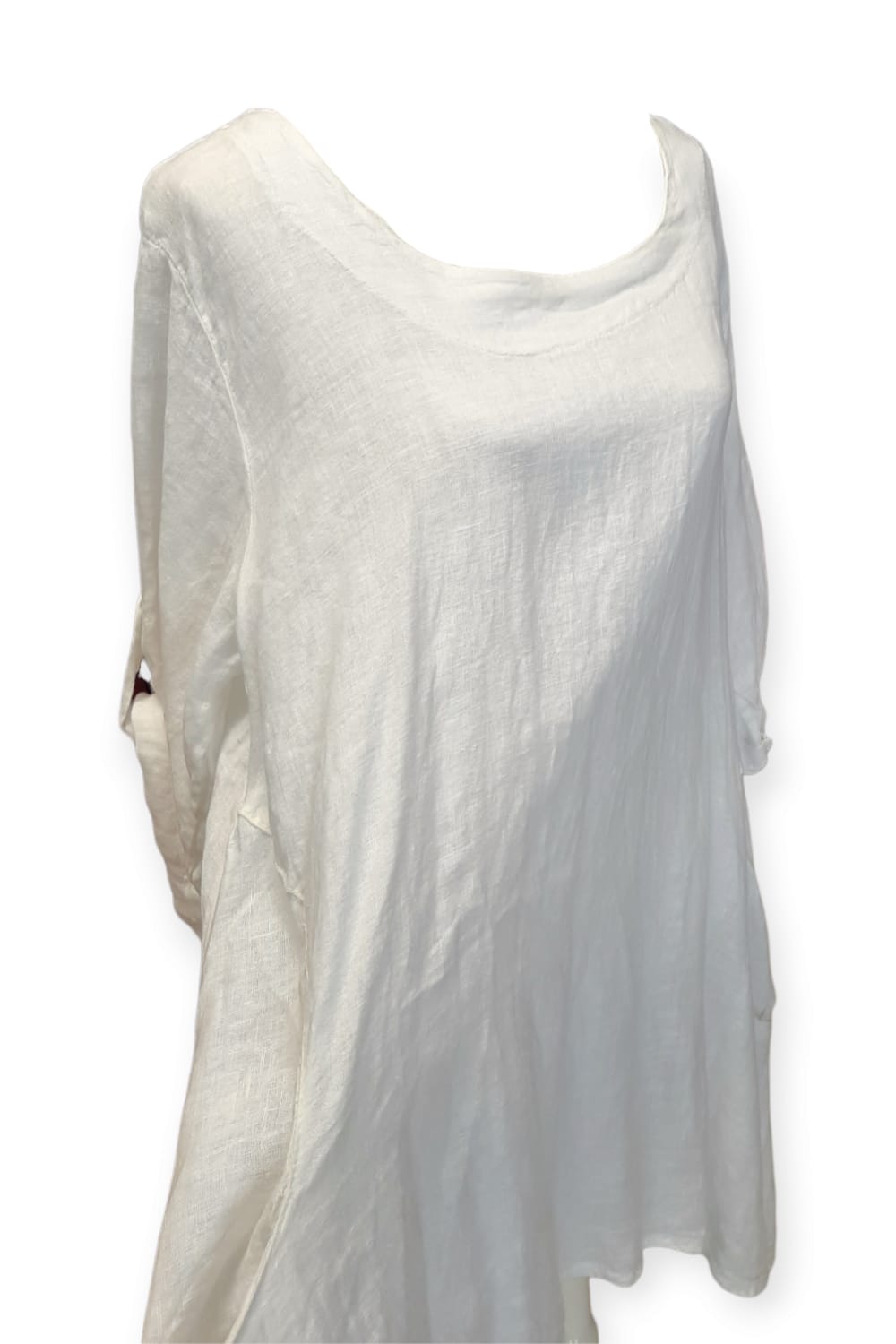 Valkoinen pellavatunika taskuilla