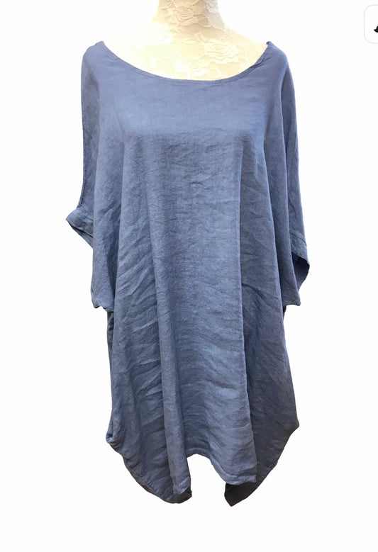 Pellavatunika pitsikoristeella selässä