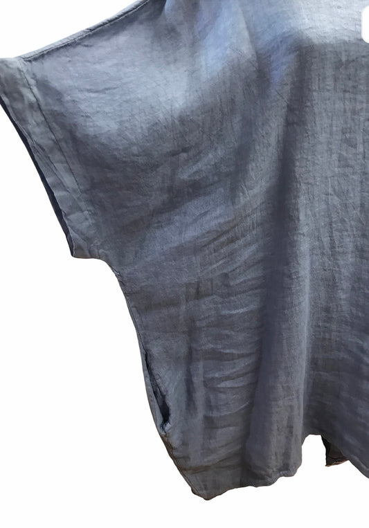 Pellavatunika pitsikoristeella selässä