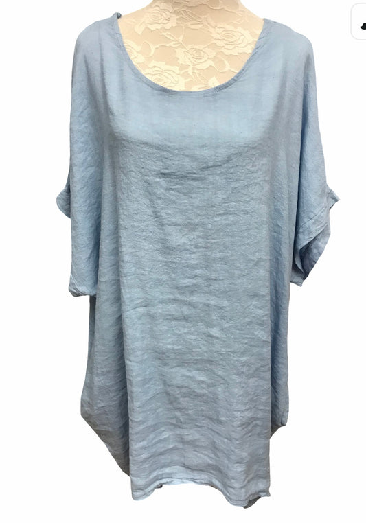 Pellavatunika pitsikoristeella selässä