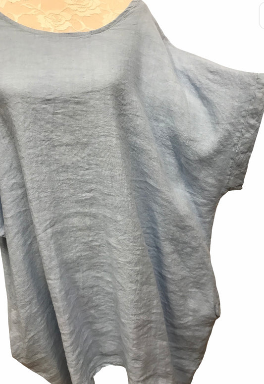 Pellavatunika pitsikoristeella selässä